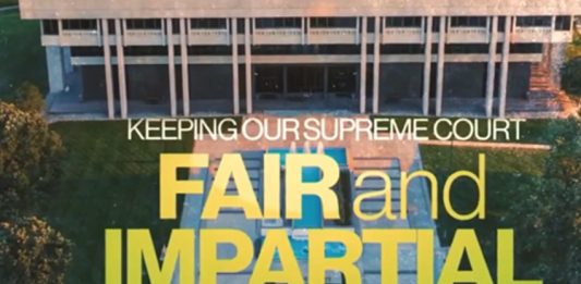 Opponents of electing justices unveil first television ad